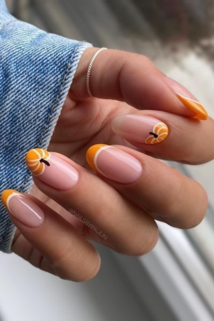 Halloween nail design with pumpkins