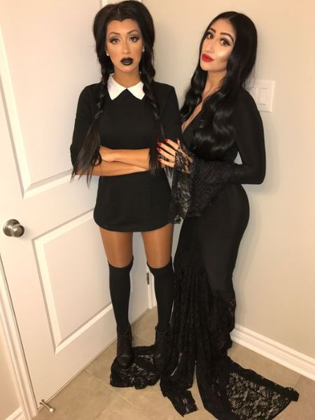 Wednesday and Morticia Addams