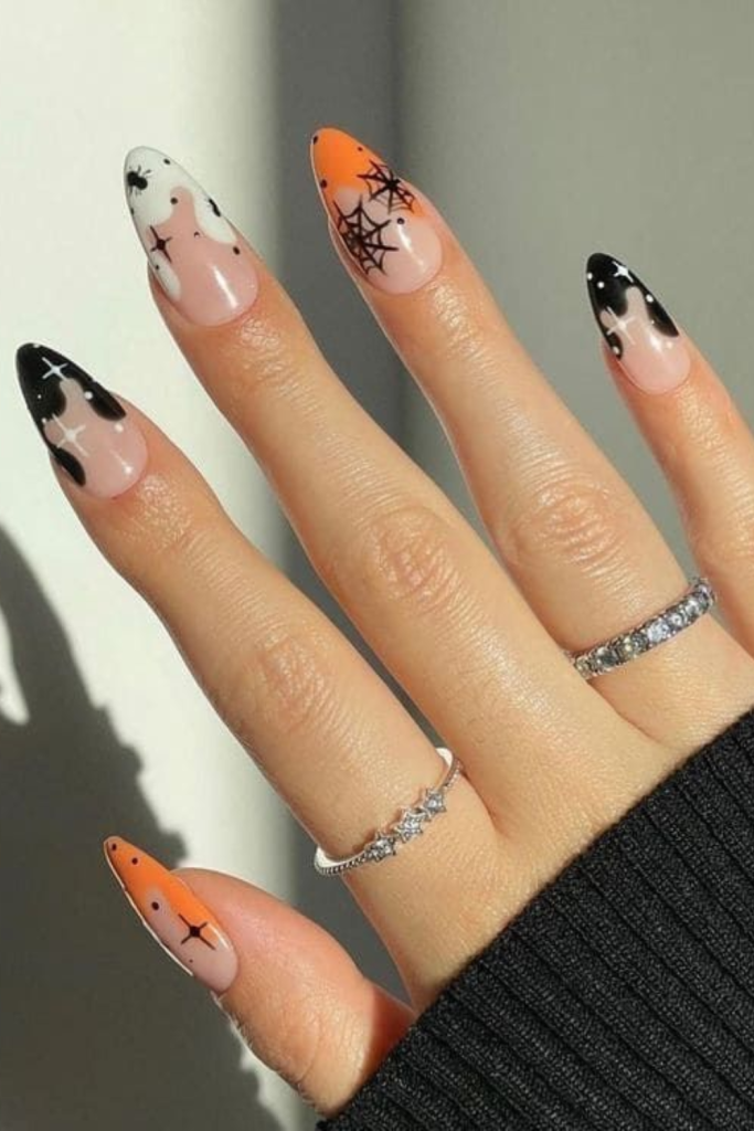 Halloween nails using spider webs