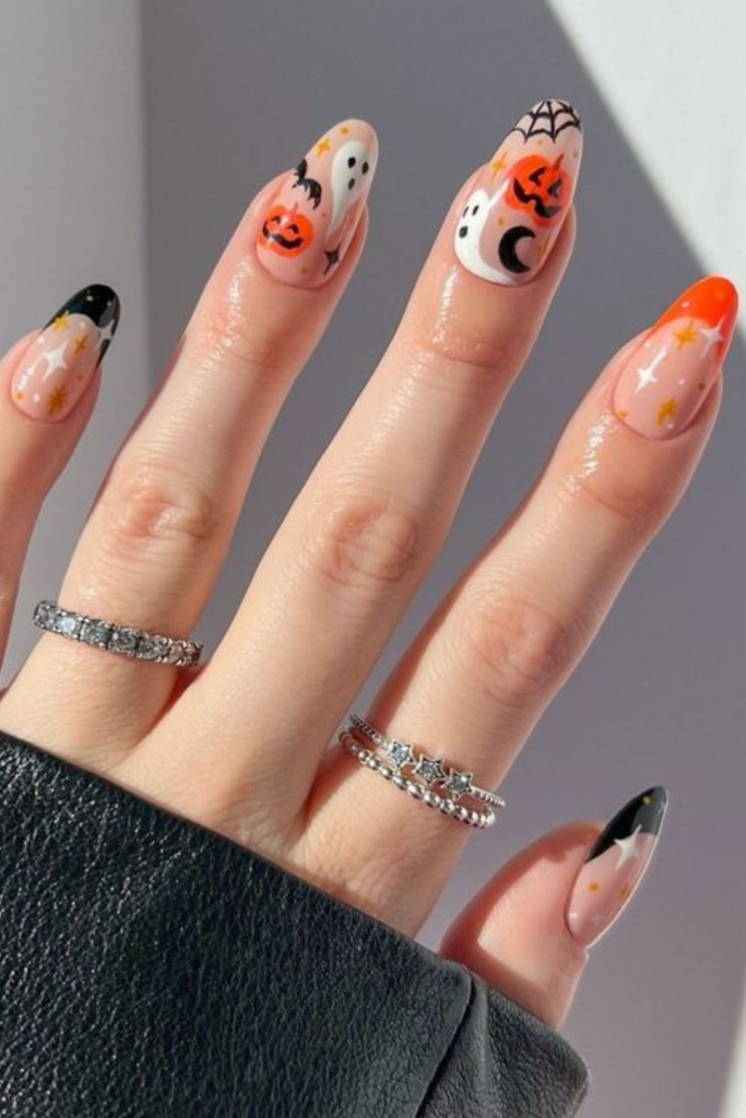 Halloween nail design with pumpkins