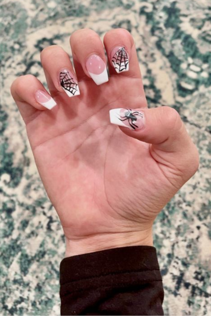 Halloween nails using spider webs