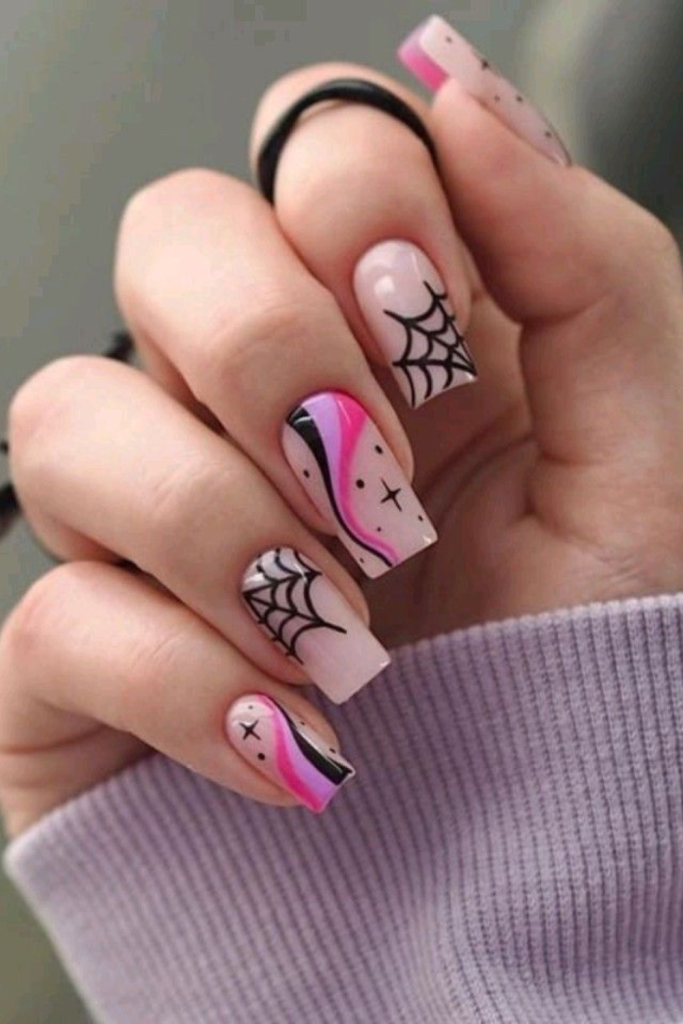 Halloween nails using spider webs