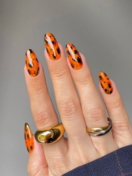burnt orange leopard print nails